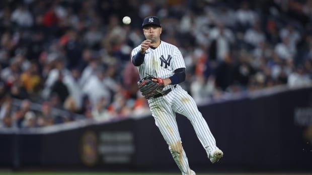 New York Yankees SS Isiah Kiner-Falefa throws to first base